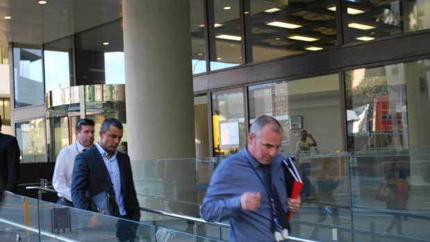 Daniel Kerr is led from a Perth court by police on Tuesday.