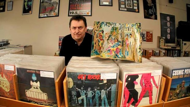 Spin it: Glenn Terry in his record shop, Vicious Sloth, with the pop-up album cover of the Twilight's LP <i>Once Upon a Twilight</i>.