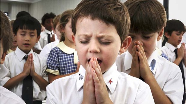 Prayer time: Fraser Rowan at John Colet School, Belrose. In NSW's public schools, recitals are allowed if their communities agree.