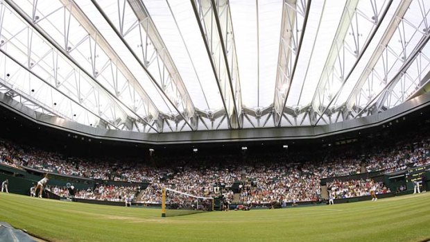 The controversial roof... Andy Murray says its closing dramatically alters the conditions usually expected on grass.