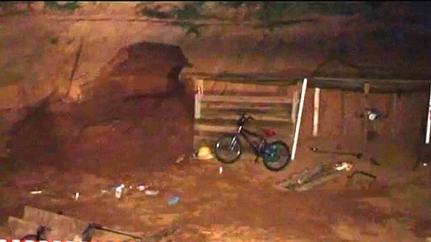 Two boys, aged 14 and 12, were playing in this storm drain when it collapsed on them.