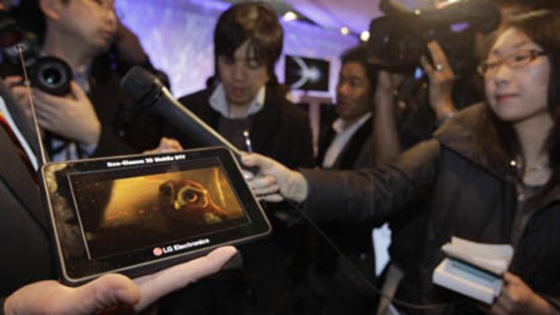 An LG 3D Mobile DTV is shown to members of the media during a press preview at the Consumer Electronics Show, Wednesday.