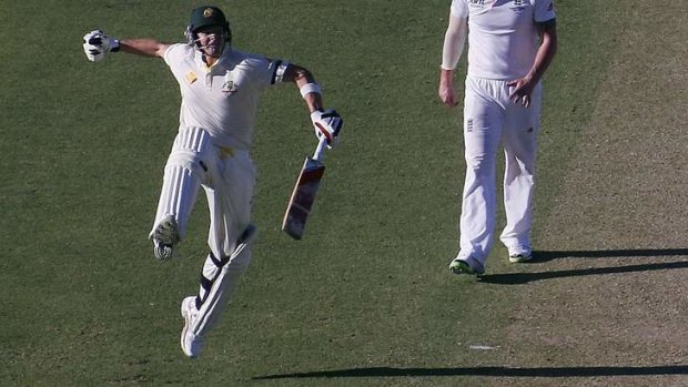 Top knock: Australia's Steve Smith celebrates after reaching his century against England at the WACA Ground.