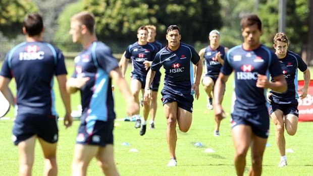Impressive start &#8230; Israel Folau takes part in sprint drills during his first training run with the Waratahs at Moore Park on Thursday.