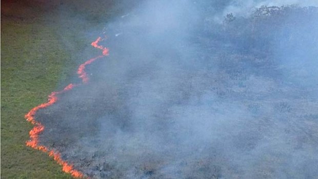 A bushfire burns through North Stradbroke Island.