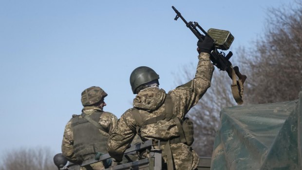 Ukrainian troops leave Debaltseve on Wednesday.
