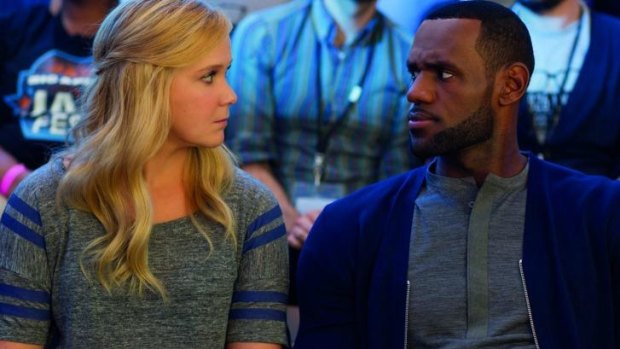 Amy Schumer and LeBron James in the film Trainwreck. 