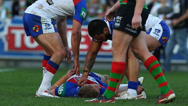 Big hit ... Kyle O'Donnell was knocked out by an accidental head clash resulting from a Sam Burgess shoulder charge - a scenario that may bring a judiciary charge next season.