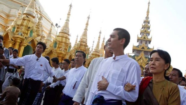 Past revisited ... Aung San Suu Kyi and her son Kim Aris visit the Shwedagon pagoda where she  first called for democracy in 1988.