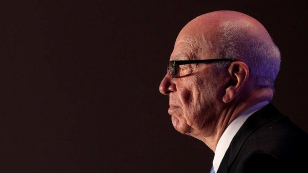 What a performer: Double duties for Rupert Murdoch.