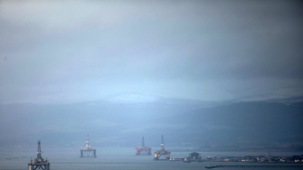 Unused oil rigs stand in the Port of Cromarty Firth in Cromarty, U.K., on Tuesday, Feb. 16, 2016. The pace of drilling in the North Sea, the center of U.K. oil production for the past 40 years, has sunk to a record as crashing energy prices force explorers to abandon costly projects. Photographer: Matthew Lloyd/Bloomberg