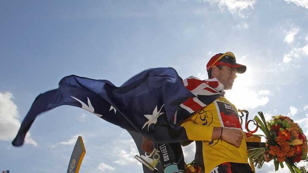 Flagging a fortune ... Cadel Evans is cycling's new king.