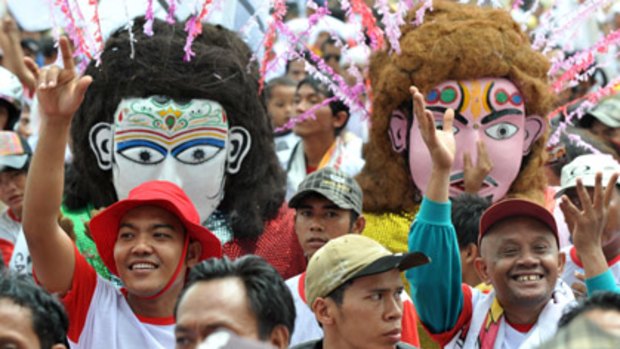 High-spirited supporters attend a colourful rally in Jakarta.