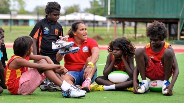 Cathy Freeman delivers boots to the children of Gunbalanya in Arnhem Land.