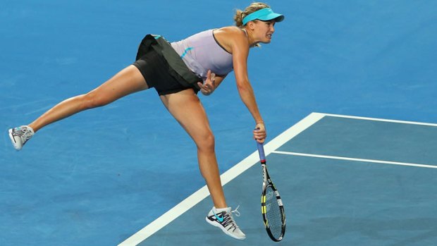 Eugenie Bouchard of Canada serves to Sam Stosur of Australia in the women's singles match during day one of the 2014 Hopman Cup at Perth Arena. (Photo by Paul Kane/Getty Images)