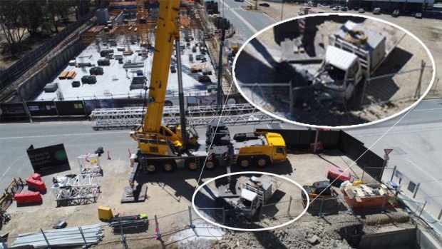 A mobile crane lost its 10-tonne counterweight load on Sunday, smashing the cabin of a truck beneath it.