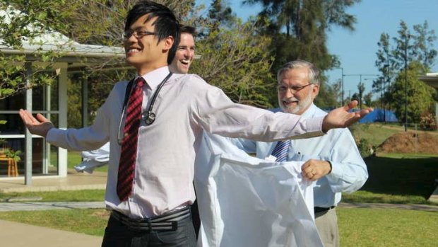 Jason Diep received his coat from Joe Canalese at the  School of Rural Health, The University of Sydney, Dubbo.
