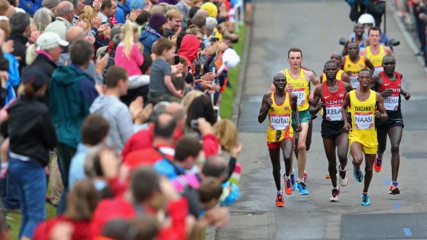 Michael Shelley, John Ekiru Kelai and Stephen Chemlany, the latter two from Kenya, during Sunday's marathon.
