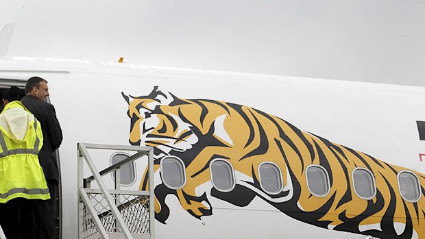 Tiger Airways CEO Tony Davis is the last passenger to board the Tiger Airways flight from Melbourne to Sydney.