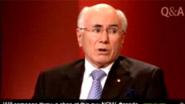 The tweet that appeared on Q&A just over a minute before a man threw his shoes at John Howard.