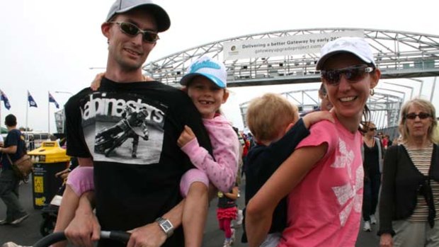 Ormiston family Dan Scott and Aline Barnett with children Georgia and Aidan foot-test the new Gateway Bridge.