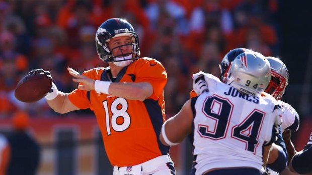 Man of mystery: Peyton Manning looks to pass against the New England Patriots during the AFC Championship game in Denver.