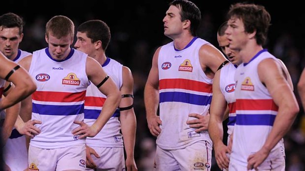 Dog of a day: Gloomy Western Bulldogs after the loss to St Kilda.