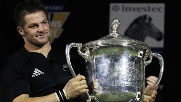 Richie McCaw of the All Blacks holds up the Bledisloe Cup in Christchurch last month.