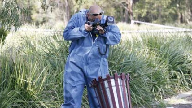 Police search for human remains  ... focus on a bin at Wheeler Oval in Sadleir.