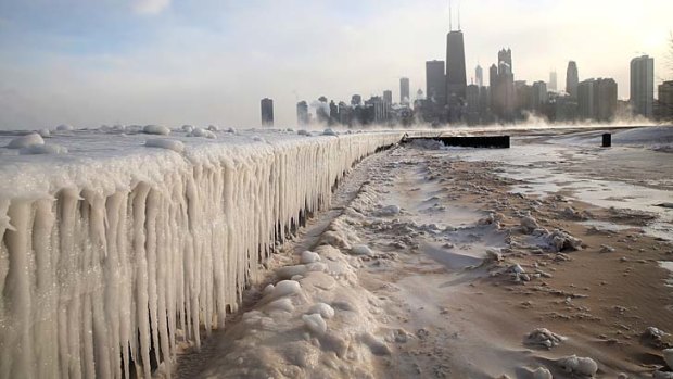 Ice builds up along Lake Michigan at North Avenue Beach as temperatures dipped well below zero.