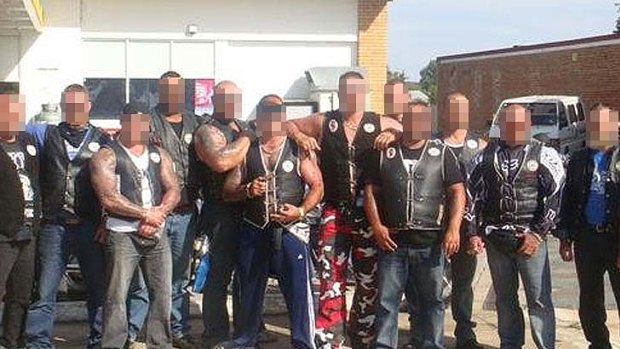 Members of the Finks pose for a photo. Their faces have been pixellated to obscure their identities in the event that a police bid to have the motorcycle club's more-than 40 members designated a criminal organisation is successful.