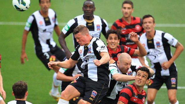 Heads up ... Dominik Ritter wins  a high ball during the Newcastle Jets' come-from-behind victory against the Western Sydney Wanderers at Parramatta Stadium on Saturday.