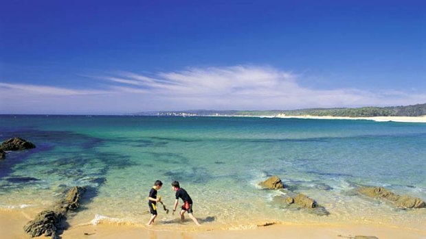 Sea change ... children play at Mimosa Rocks.