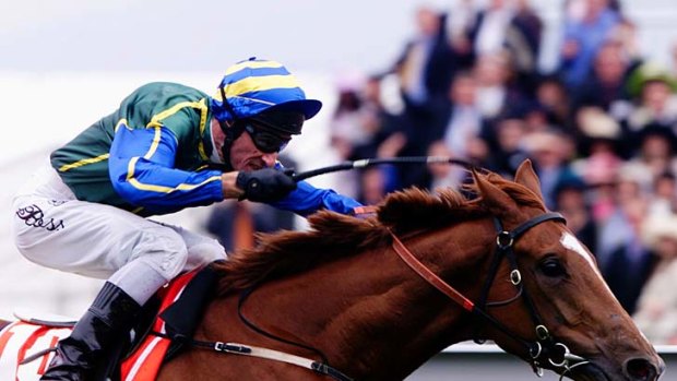 Glen Boss and Hit The Roof race clear of the field in the Victoria Derby in 2000.