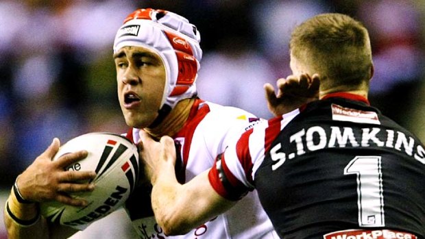 Jamie Soward fends off Sam Tomkins.