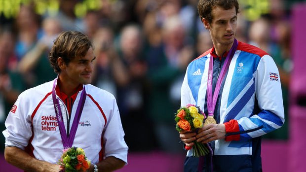 Andy Murray may have won gold ... but  Roger Federer (left) is still ahead of him in terms of earnings.