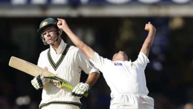 Mohammad Asif celebrates the wicket of Australian captain Ricky Ponting.
