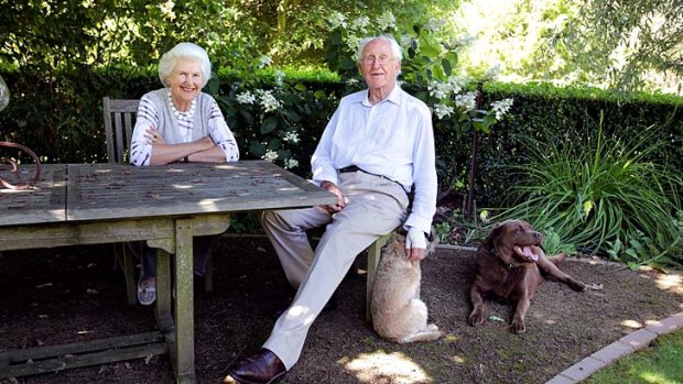 Tamie and Malcolm Fraser and their companions Grizzle and Choco in the garden at their Merricks property on the Mornington Peninsula.
