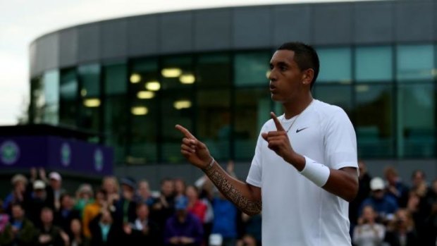 Nick Kyrgios of Australia celebrates after winning his Gentlemen's Singles third round match against Jiri Vesely of Czech Republic on day six of the Wimbledon Lawn Tennis Championships.