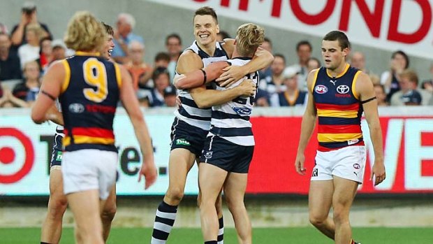 Earning his stripes: Hamish McIntosh celebrates a goal with Josh Caddy.