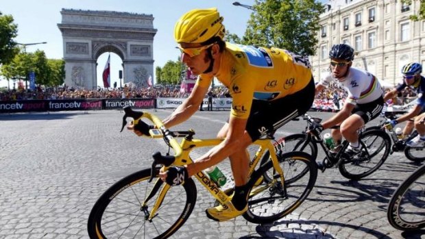 Tour champ ... Bradley Wiggins winning the Tour de France in 2012.