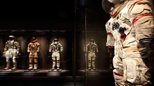 Cosmic fashion ... space suits on display at the Kennedy Space Centre.