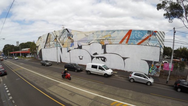 The potential development site's  Smith Street border is home to the recently defaced iconic 1980s feminist mural.