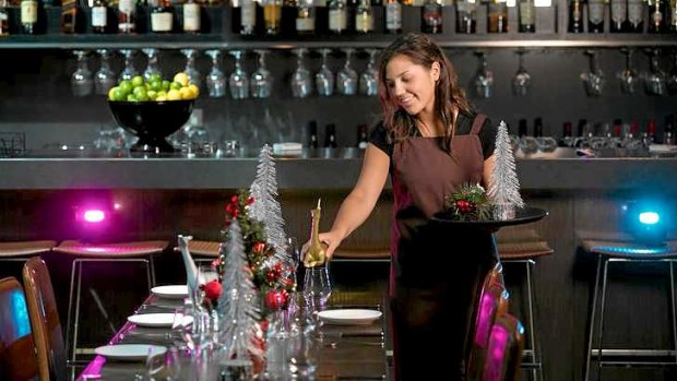 Festive trimmings: Tamara Webb prepares a Christmas table at No. 8 by John Lawson restaurant at Crown Casino where it's all about the turkey.