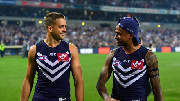 Brothers Stephen Hill and Bradley Hill celebrate the Dockers win over North Melbourne.