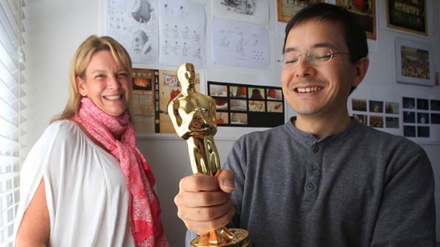 Golden time: Shaun Tan and producer Sophie Byrne with the statue that could keep them busy for years.