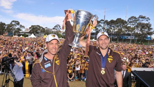 Hawthorn coach Alistair Clarkson and captain Luke Hodge with the premiership cup at Glenferrie oval.