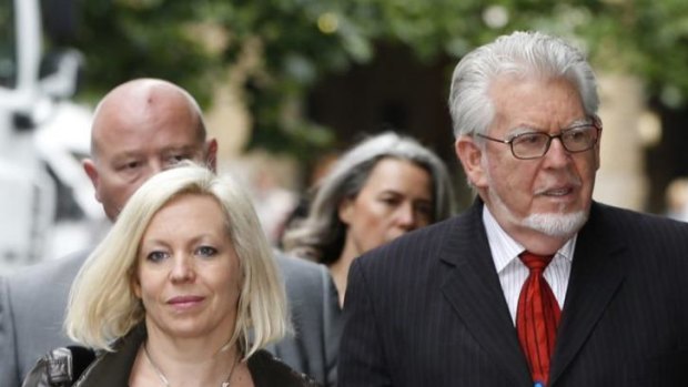 Summing up: Rolf Harris arrives with his daughter Bindi, left, at Southwark Crown Court.