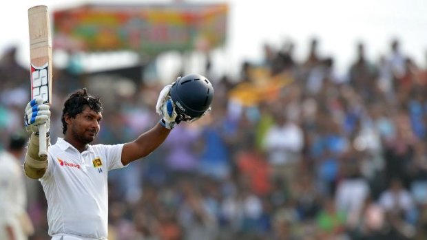 Kumar Sangakkara acknowledges the applause from the crowd after he reached 200.