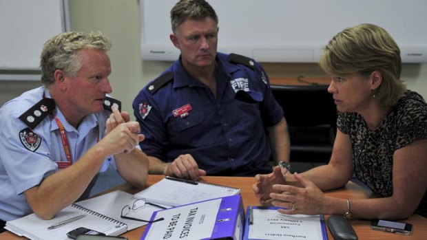 Chief Superintendent Ken Murphy, Inspector Wayne Phillips and NSW member for Burrinjuck Katrina Hodgkinson at a morning briefing in Queanbeyan.